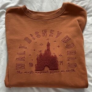 Disney orange Sweatshirt with Castle Design